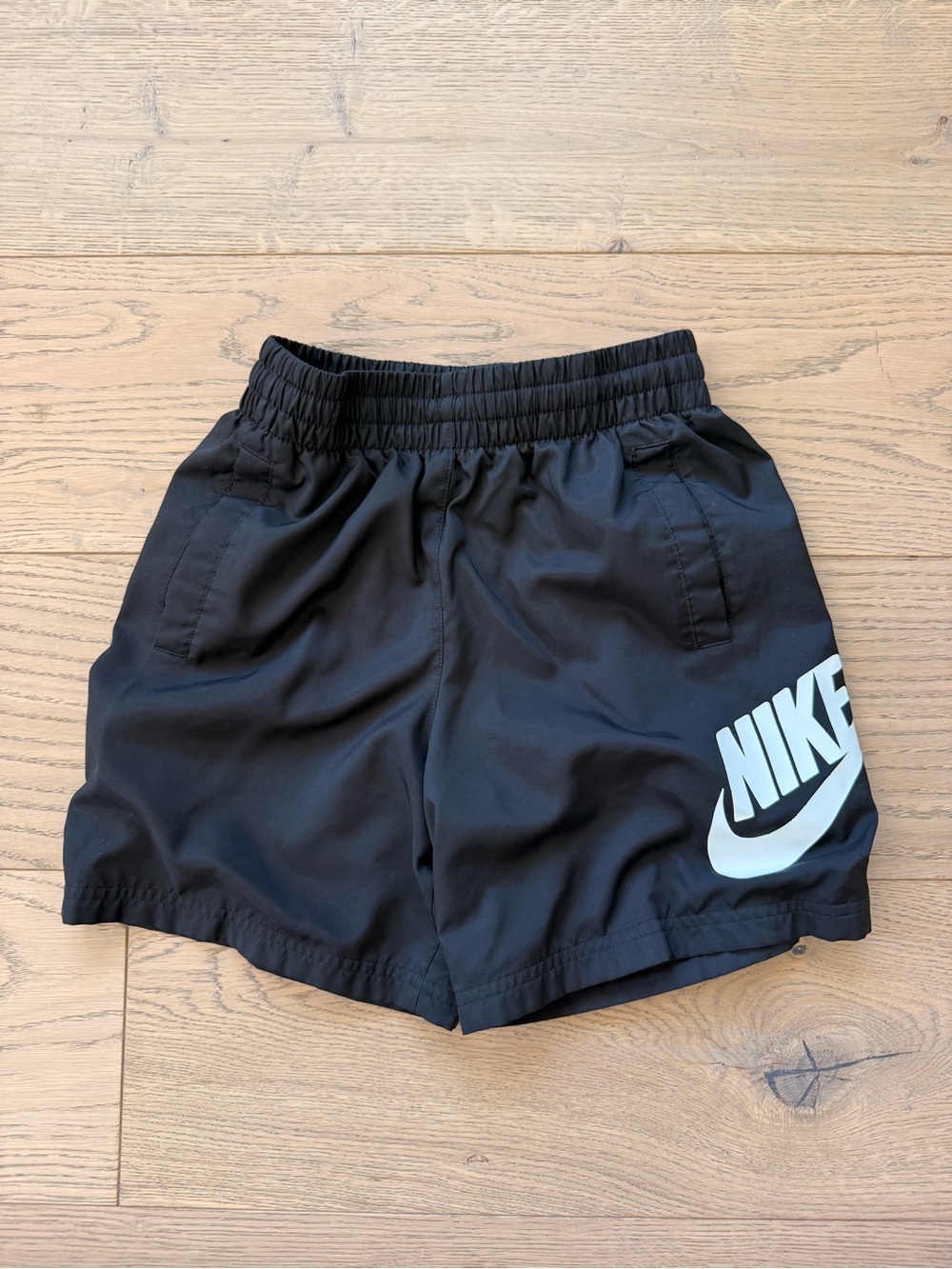 Nike youth Black Athletic Shorts with White Logo